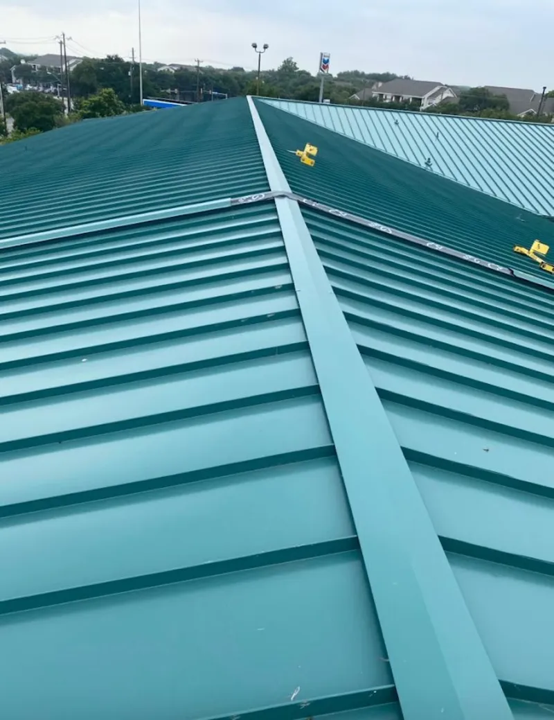 Green commercial metal roof ridge and valley for Metal Roof Repair in New Philadelphia