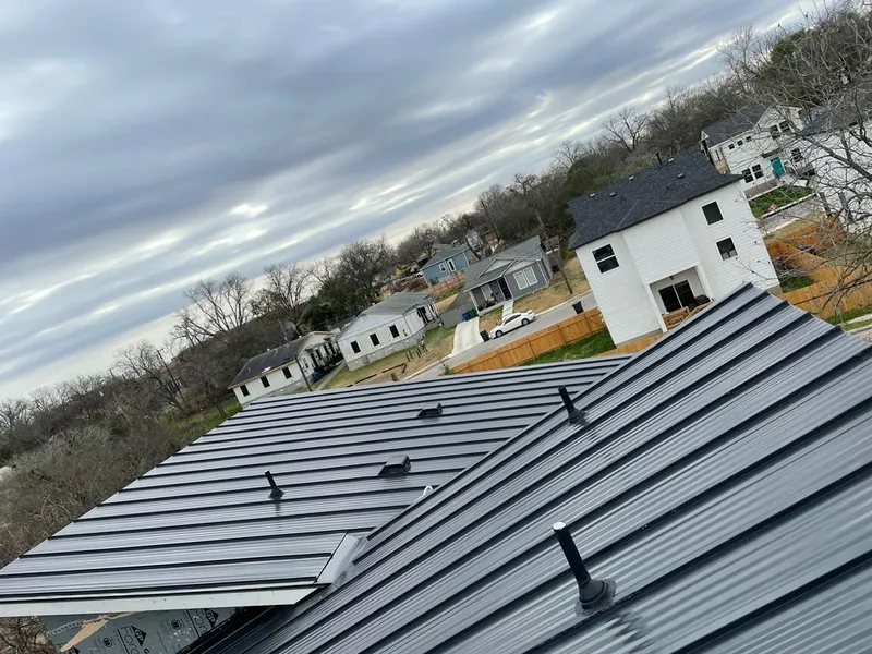 Standing seam metal roof panels with vents for Skylight Repair in New Philadelphia